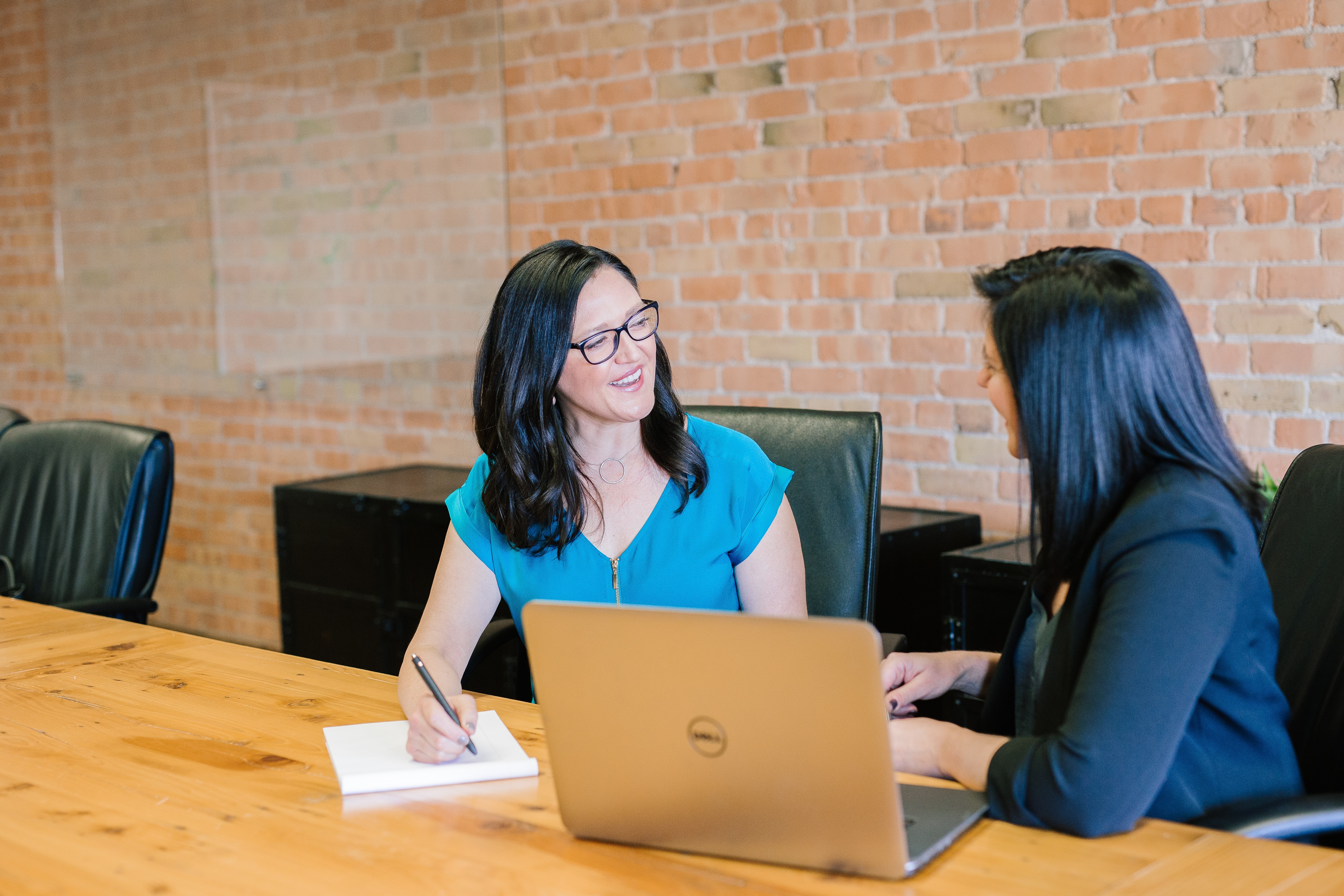 A real estate agent negotiating a higher commission split with her broker