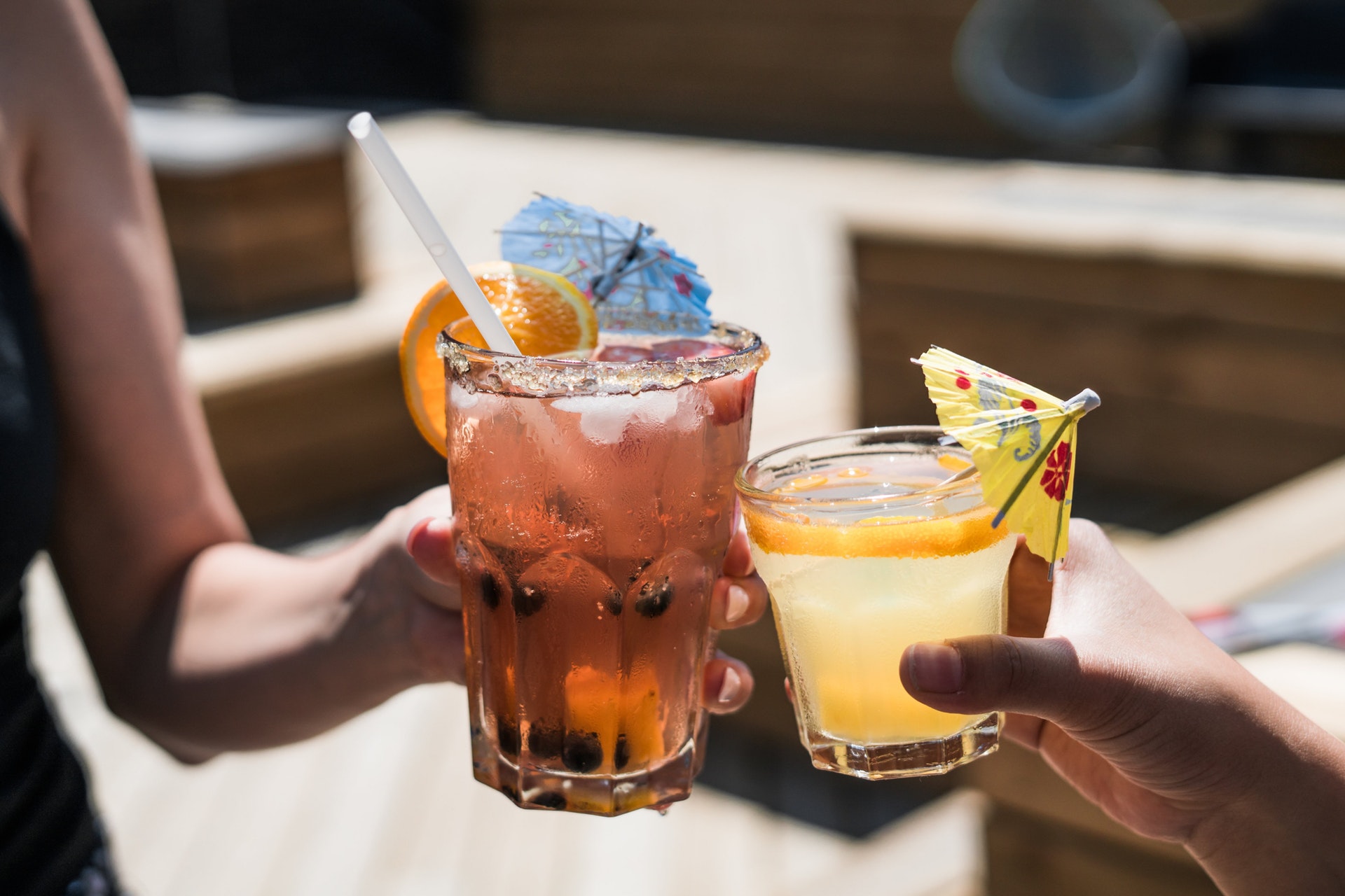 Alcoholic cocktai s served in backyard of open house