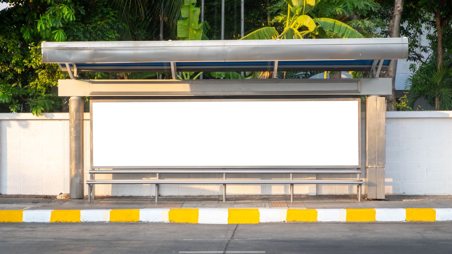 Bus stop bench with blank advertising space