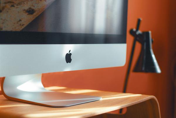 Close up of an apple computer ready to create logo