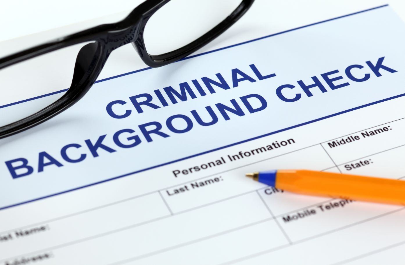 Criminal background check paperwork being filled out
