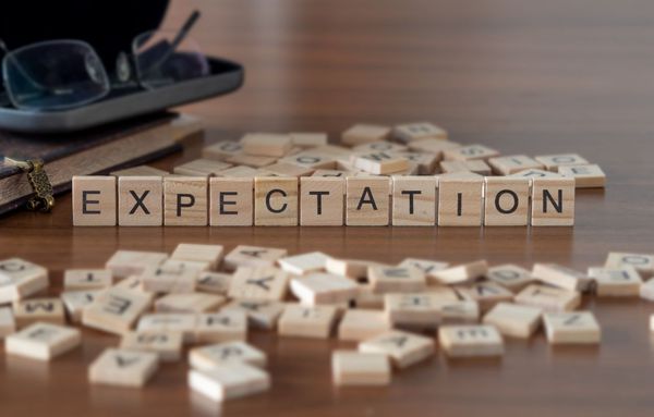 Expectation spelled out using scrabble pieces
