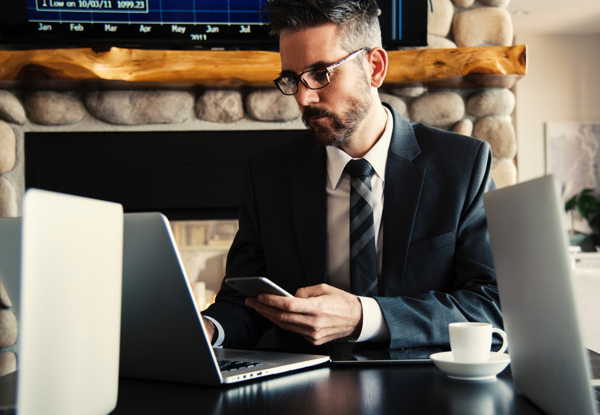 Real estate agent drinking coffee to stay productive during day