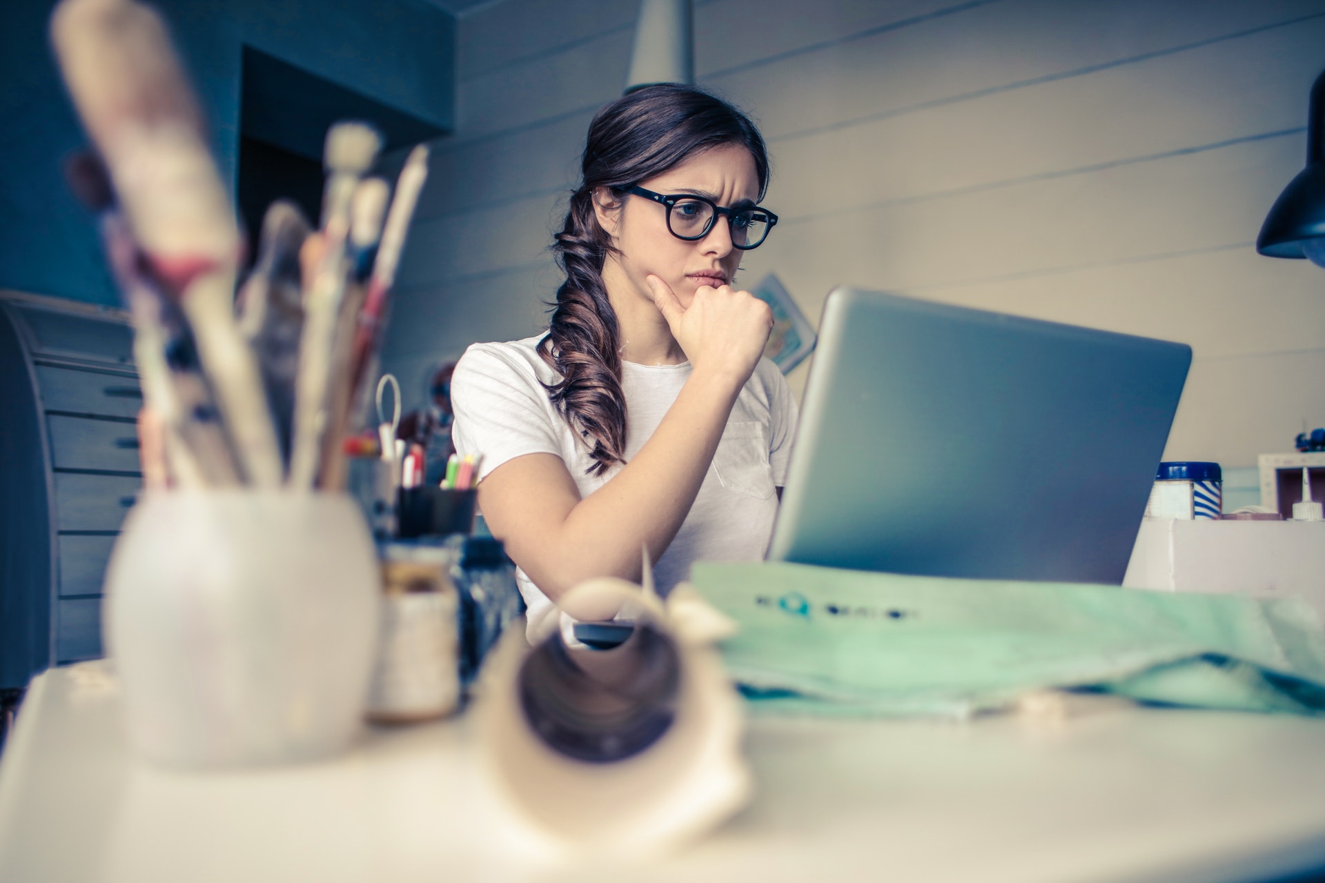 Woman browsing the internet on laptop